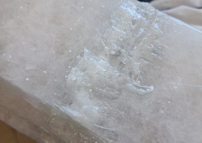Close up of quartzite sink edge repair