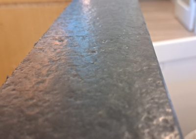 Granite countertop seam blended after repair close-up