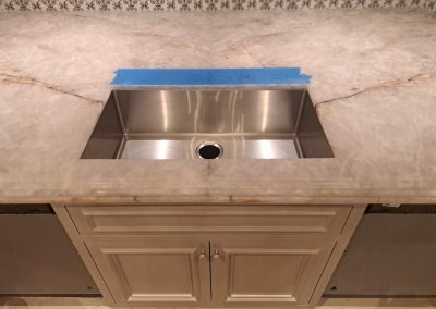 Undermount sink installation in stone countertop with cutout